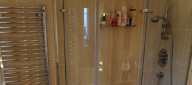 Shower and towel rail in loft conversion bathroom